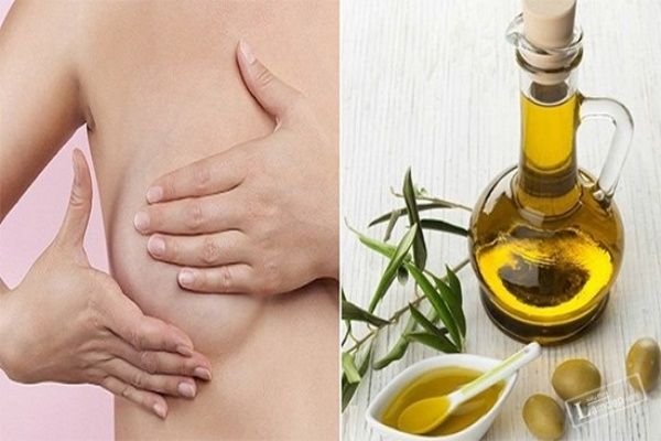 Massage ngực bằng tinh dầu, dầu dừa.